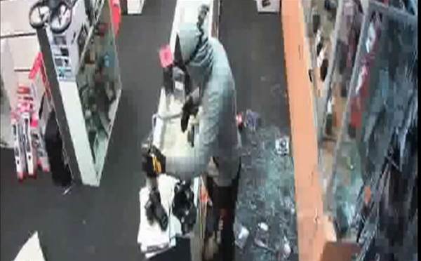 Police hunt Harvey Norman break-in suspects