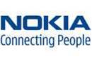 Nokia cuts losses, beats sales estimates