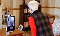 Elderly in UK care home embrace technology to beat coronavirus lockdown