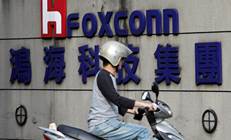 Apple supplier Foxconn cautious on outlook