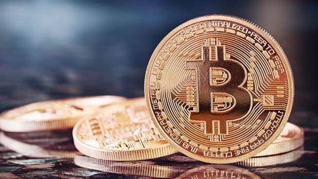 Bitcoin hits record $3,000, then drops