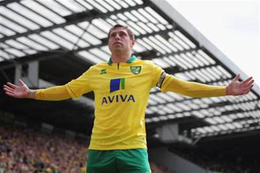 Holt Signs New Norwich Deal Holt Signs New Norwich Deal