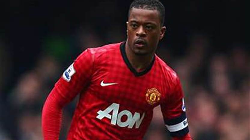 Evra proud of United character