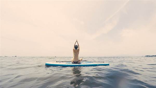 I Tried Doing Yoga On A Stand-Up Paddleboard&#8212;Here's Why You Should Too