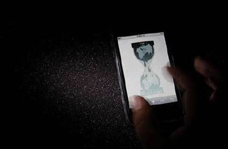 UK police arrest WikiLeaks backers for cyber attacks