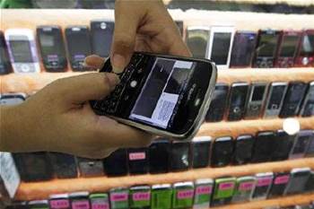 RIM's hub down as BlackBerry maker sacks staff