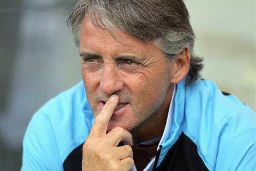 Mancini: Dzeko, Tevez Staying Mancini: Dzeko, Tevez Staying