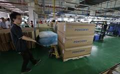 Foxconn freezes hiring at biggest plant