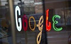 Ads and Motorola dent Google earnings