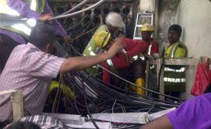 SingTel engineers work to recover from exchange fire