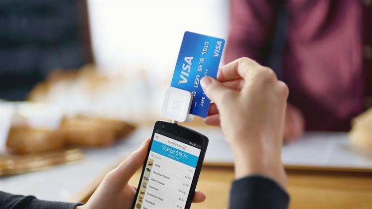 Square shares jump 60 percent in market debut