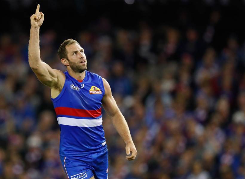 Travis Cloke hangs up the boots.. and glove Travis Cloke hangs up the boots.. and glove