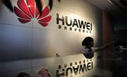 Huawei boosts cash take in turbulent year