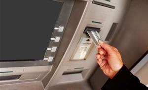 ATM use hits 15-year low as tap-and-go payments surge
