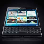 BlackBerry cuts loss, sales rise