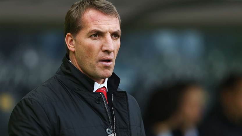 Rodgers lauds Suarez as Liverpool go top
