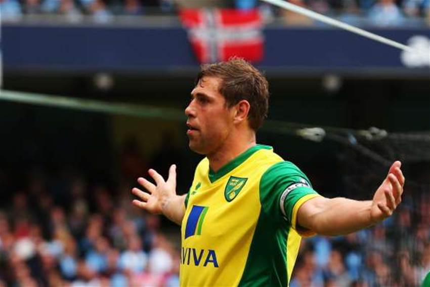 Wigan snap up Norwich striker Holt Wigan snap up Norwich striker Holt