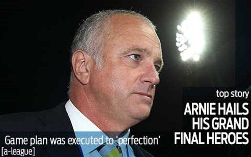 Arnie hails his grand final heroes Arnie hails his grand final heroes