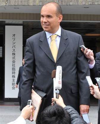 Olympus settles unfair dismissal case with ex-CEO
