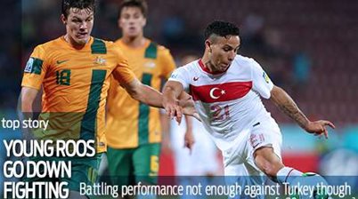Young Socceroos go down fighting