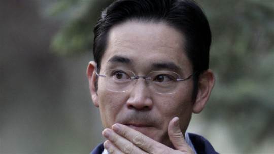 Samsung boss spends first night in a cell