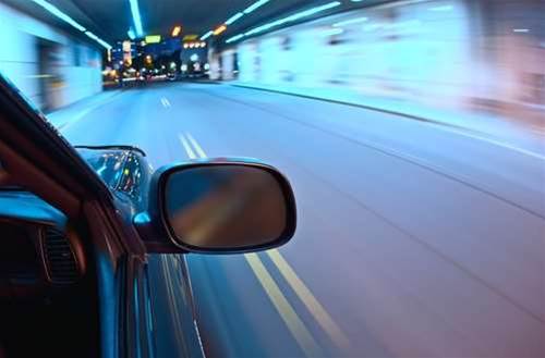 Victorian man fined for driving car with knees