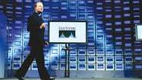Cisco profit slides by nearly half