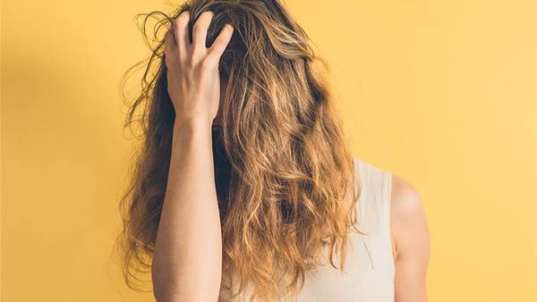 4 Surprising Ways Stress Can Ruin Your Hair