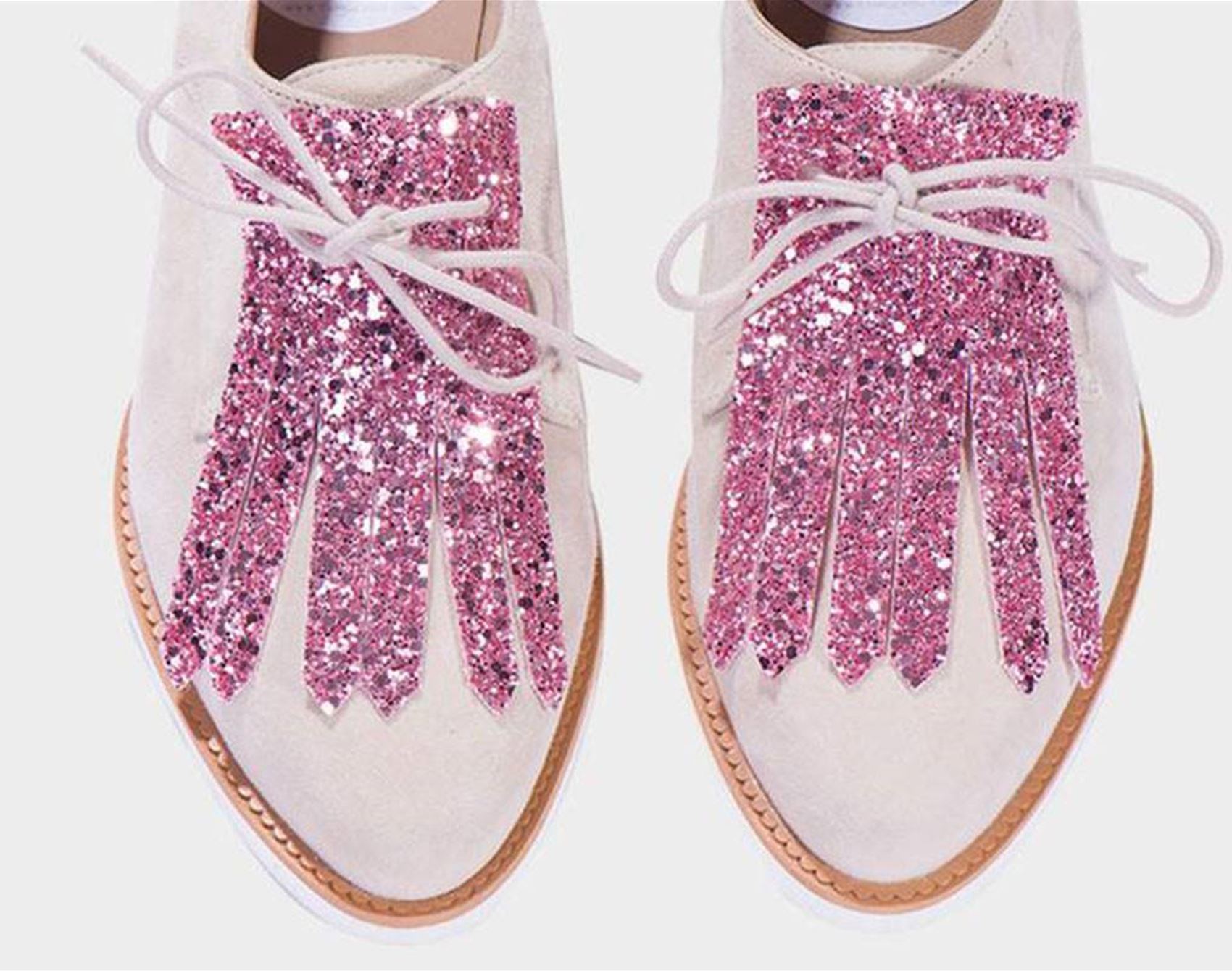 jazz up your shoes with detachable fringe 'kilts'