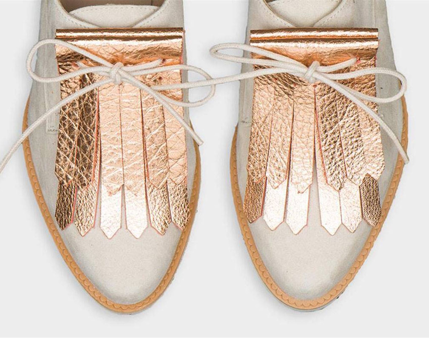 jazz up your shoes with detachable fringe 'kilts'