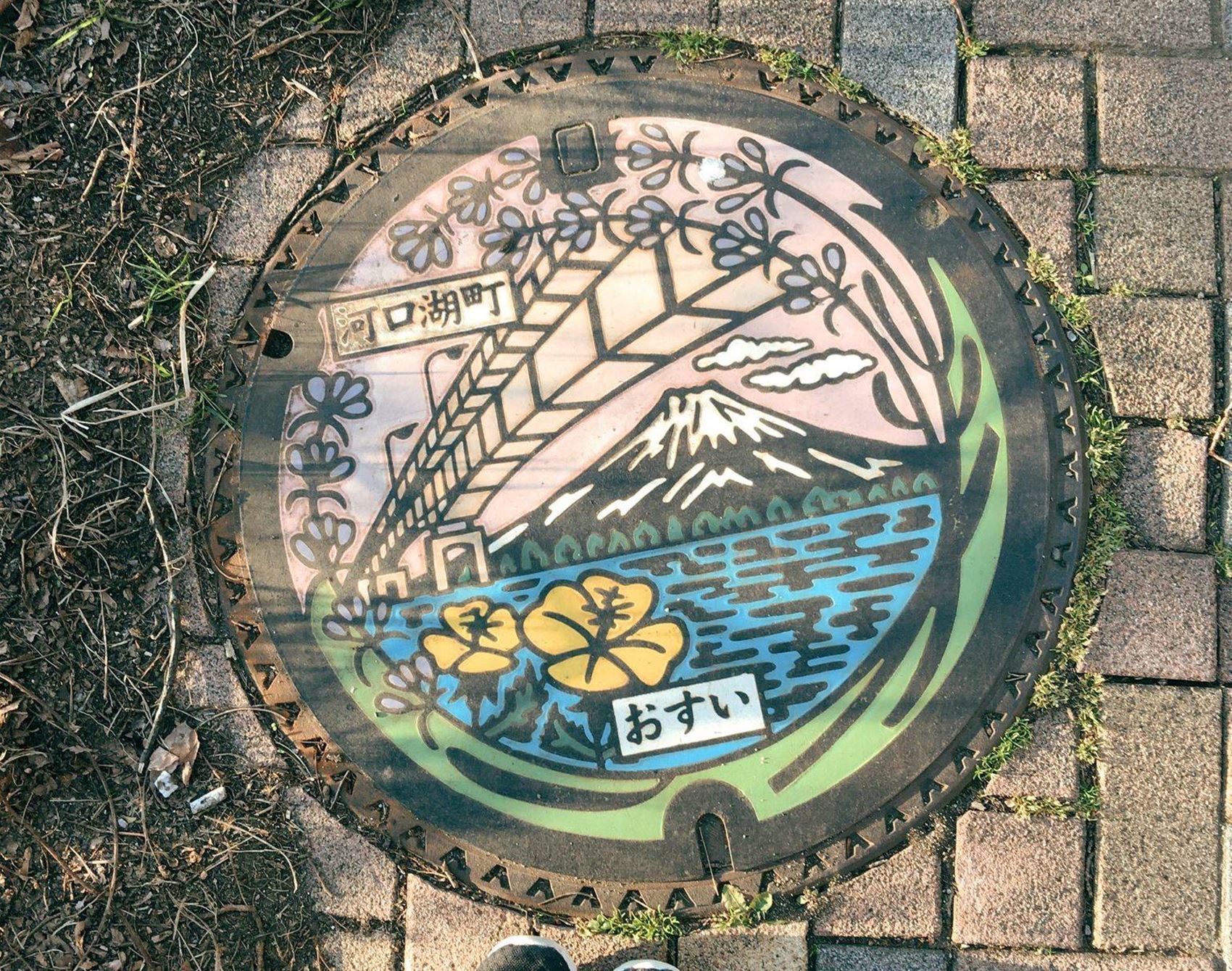 the curious story behind japan's manhole covers