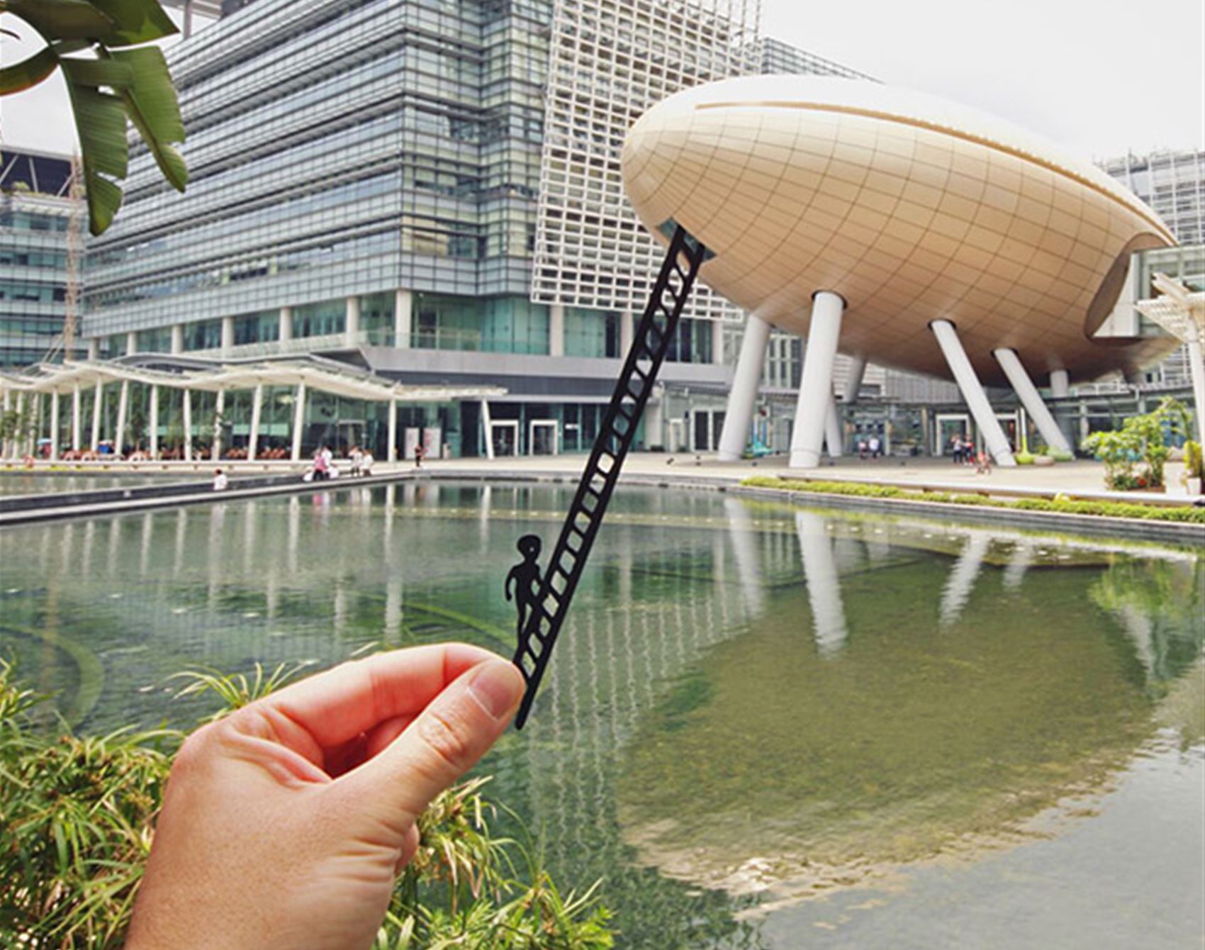 playful paper cut-outs turn landmarks into art