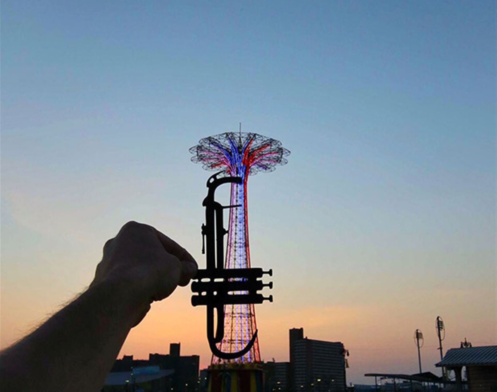 playful paper cut-outs turn landmarks into art