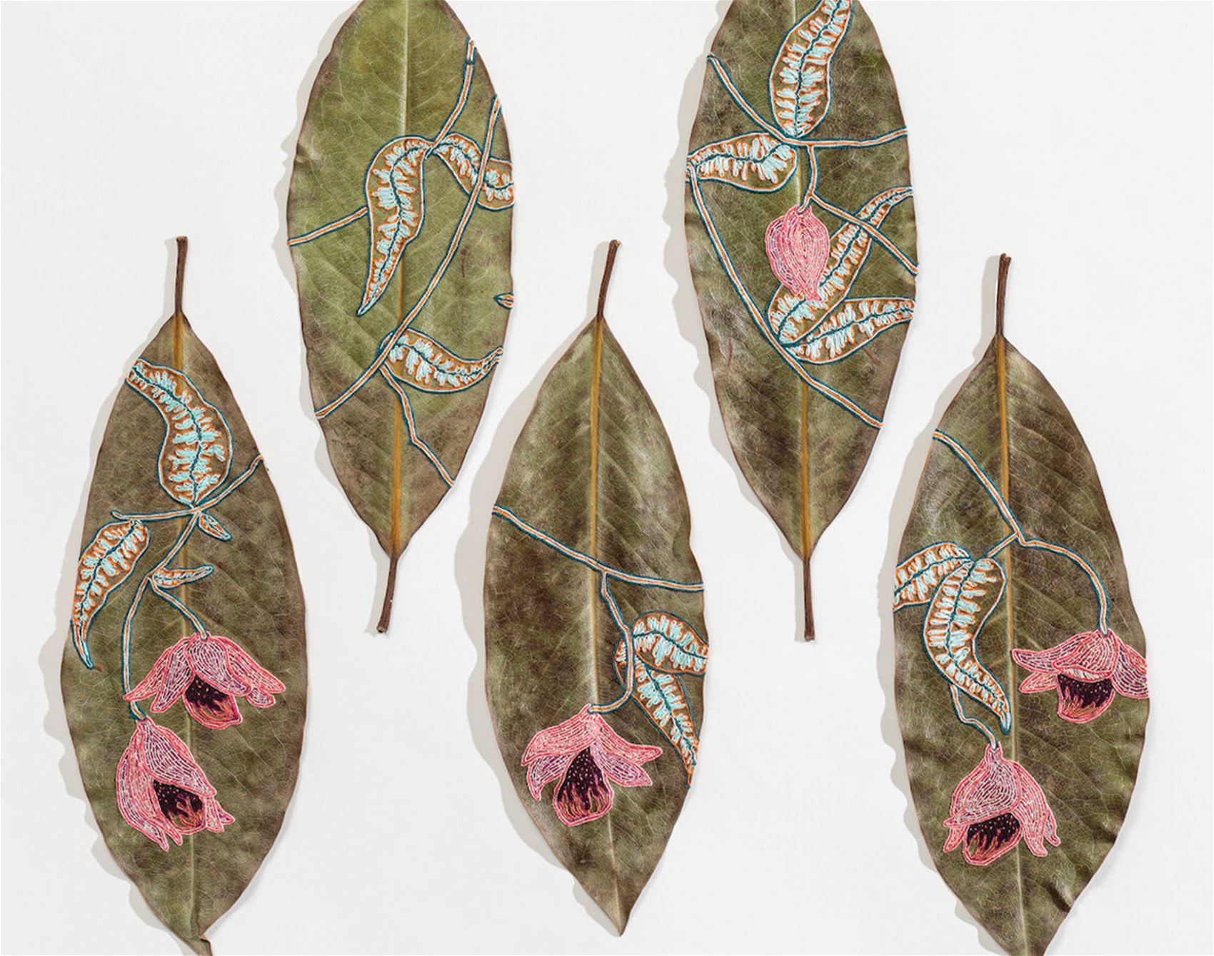 this artist delicately cuts and stitches botanicals by hand