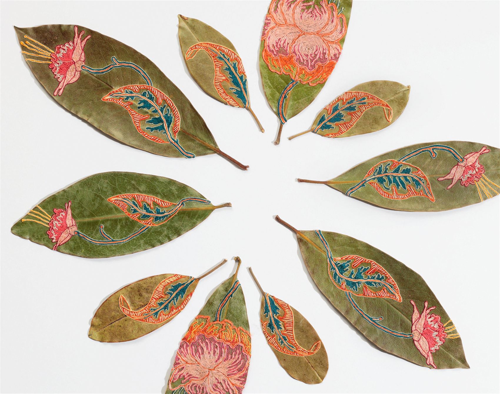 this artist delicately cuts and stitches botanicals by hand