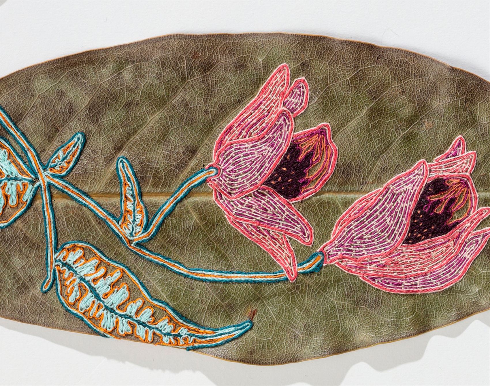 this artist delicately cuts and stitches botanicals by hand