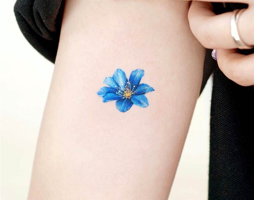 this artist creates delicate watercolour tattoos
