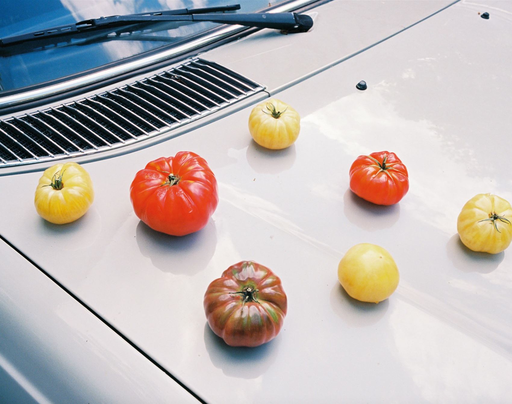 this berlin shutterbug snaps fruit and veggies on cars