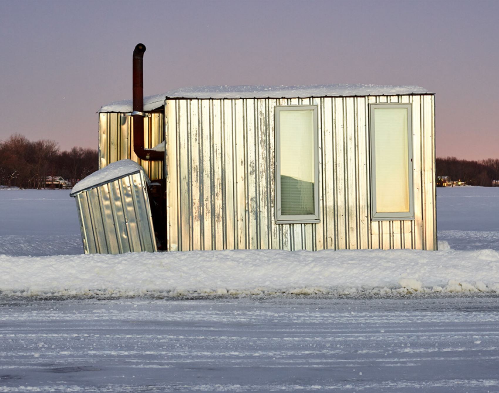 richard johnson snaps colourful ice huts in the canadian wilderness