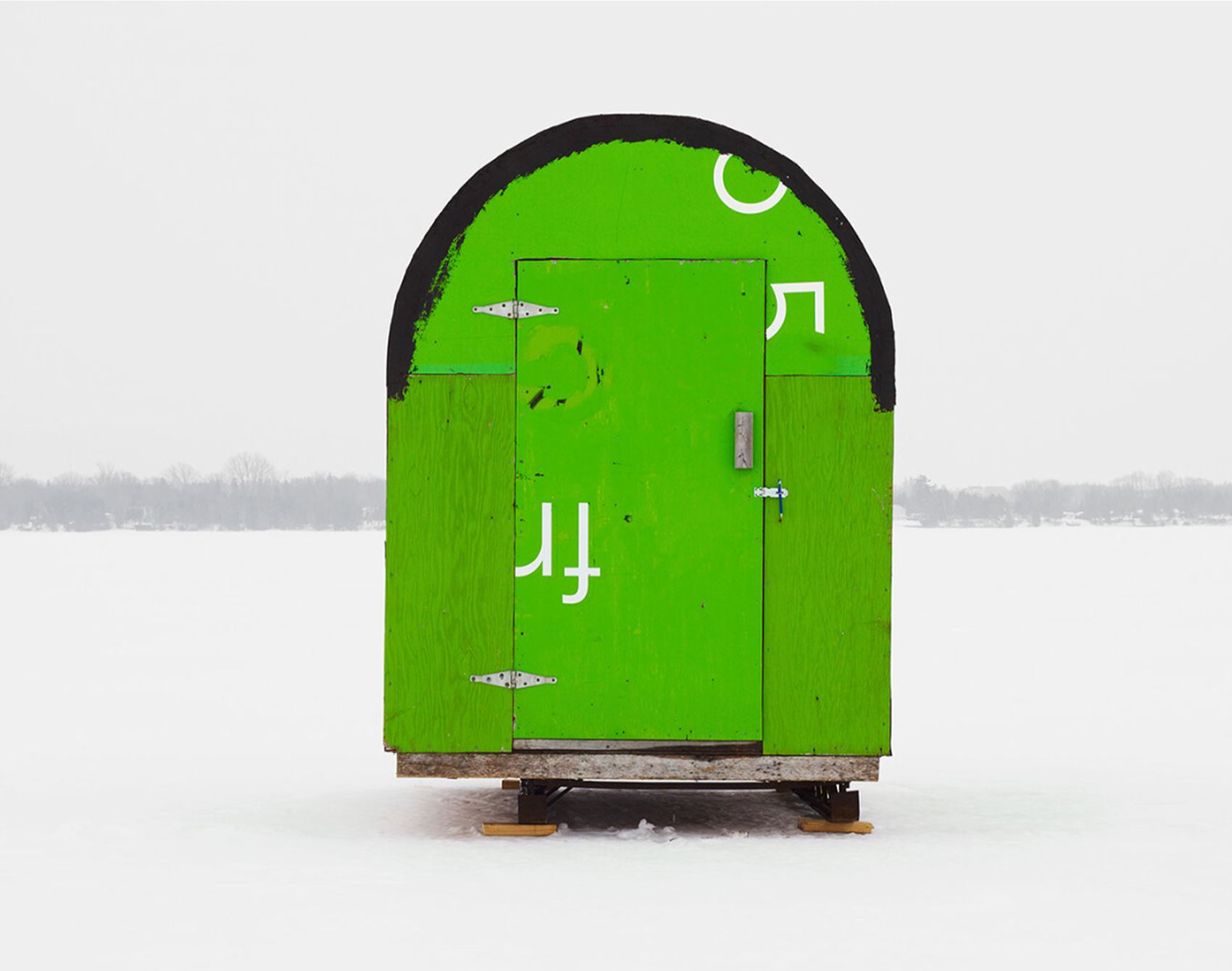richard johnson snaps colourful ice huts in the canadian wilderness