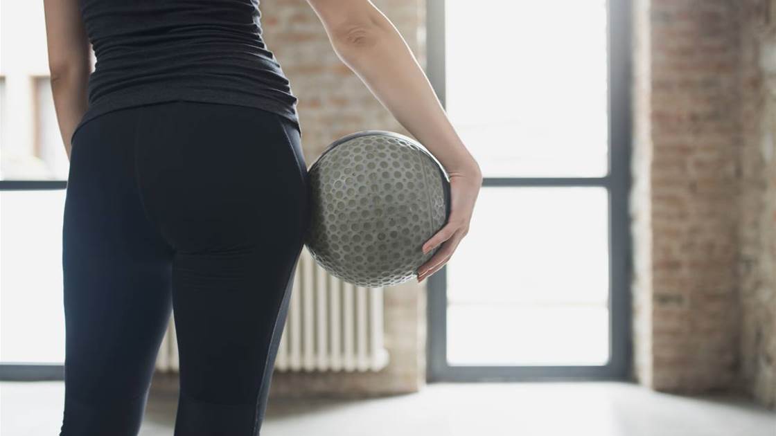 This 15-minute ball workout will slim your thighs fast