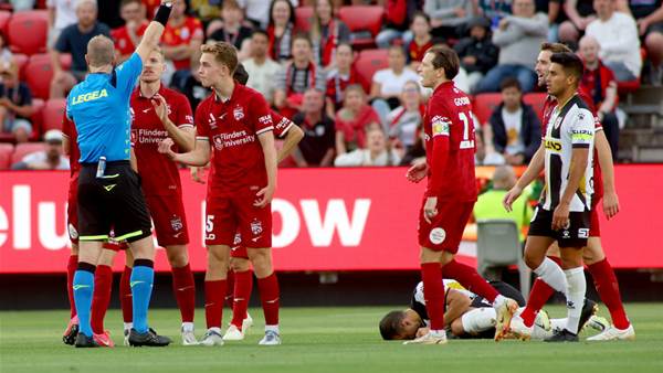 Ten-man Reds hold on for A-League Men win