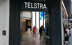 Telstra shares fall below $3 in seven-year low