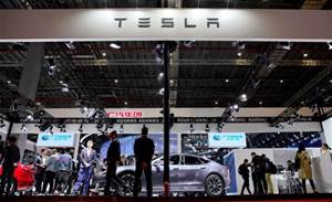 Tesla stock and bonds tumble as investors fret about costs and safety