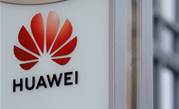 Huawei sees first-half profit drop 52 percent