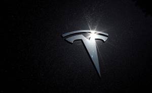 Tesla's value drops US$50 billion as Musk's promised cheaper battery three years away