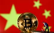 China's top regulators ban cryptocurrency trading and mining