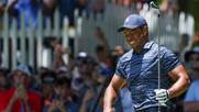 Woods winces to opening 74 at PGA