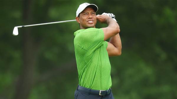 Tiger grinds to make PGA weekend