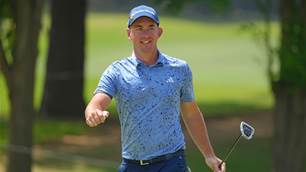 Despite travel dramas, Herbert shares lead in Japan